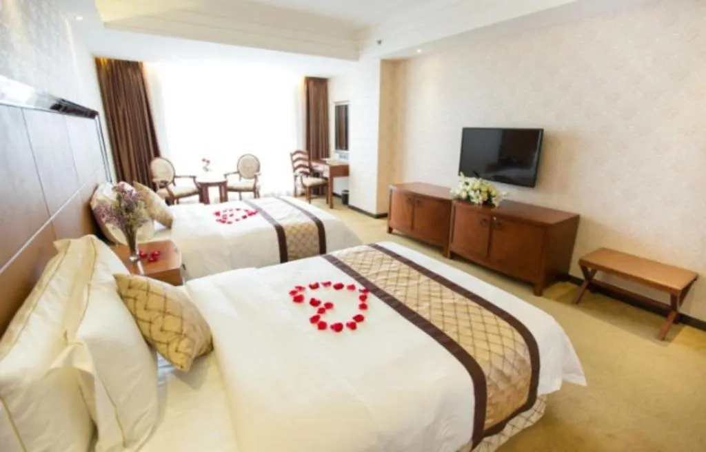 Bed in Auspicious Hotel