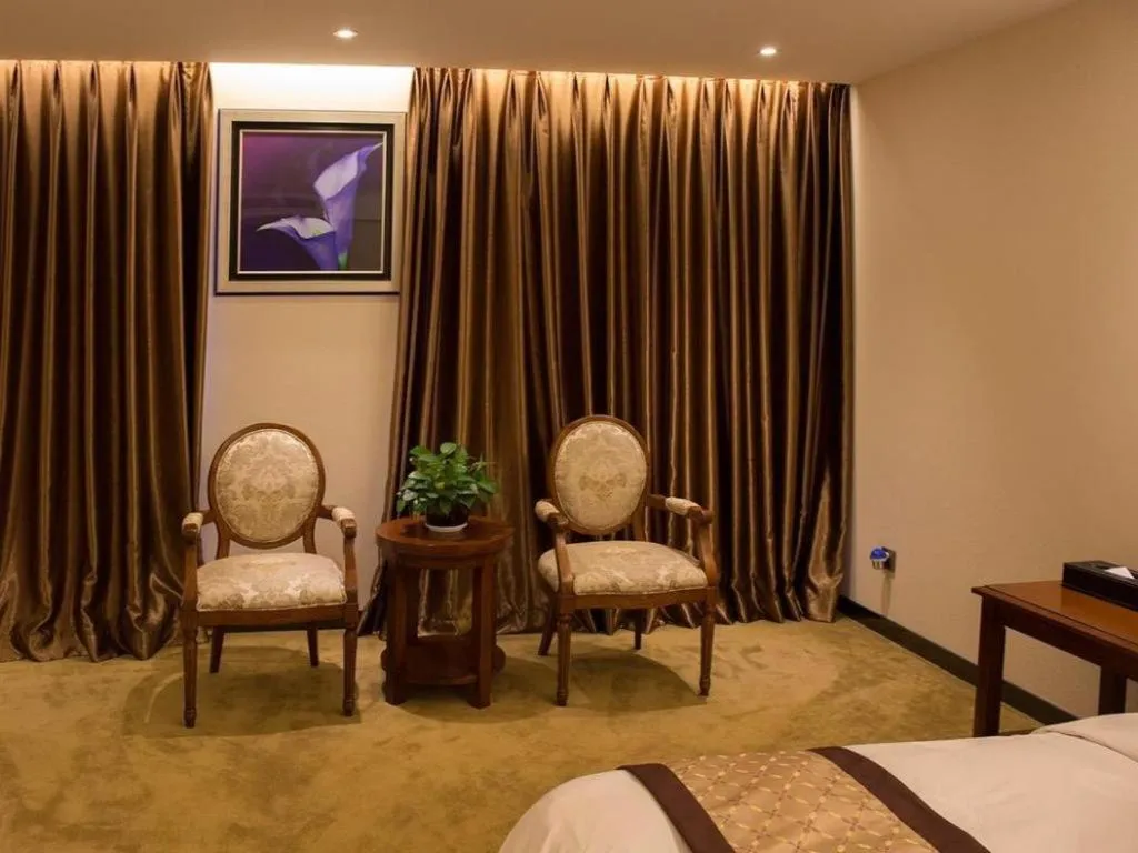 Bed in Auspicious Hotel