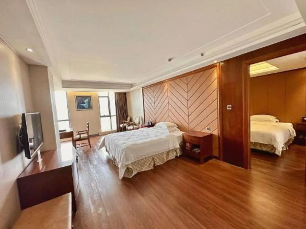 Bed in Auspicious Hotel