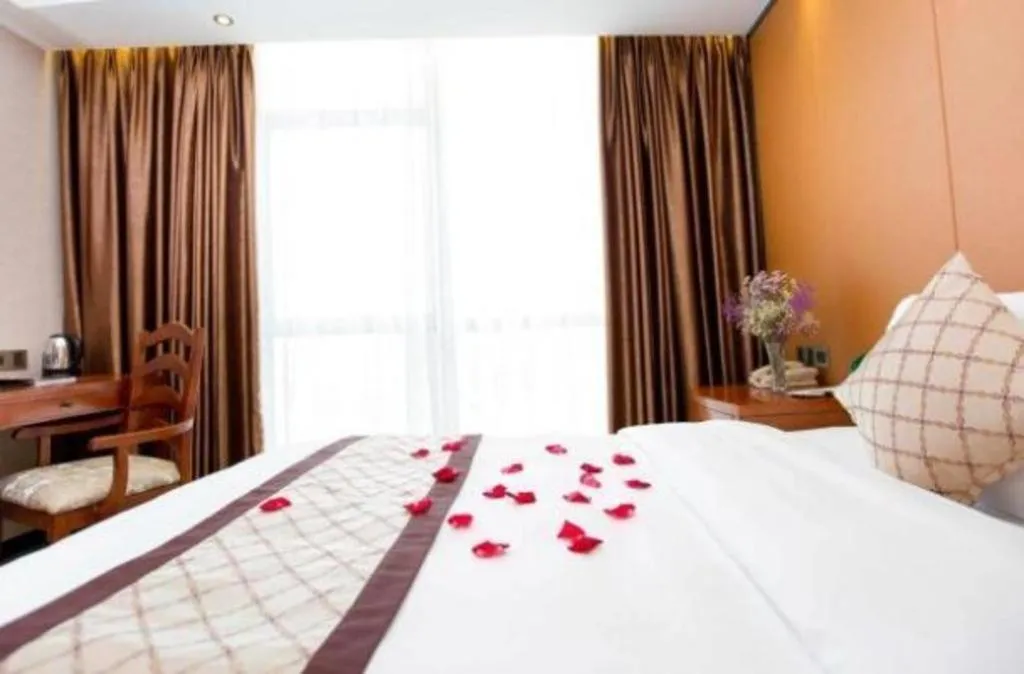 Bed in Auspicious Hotel