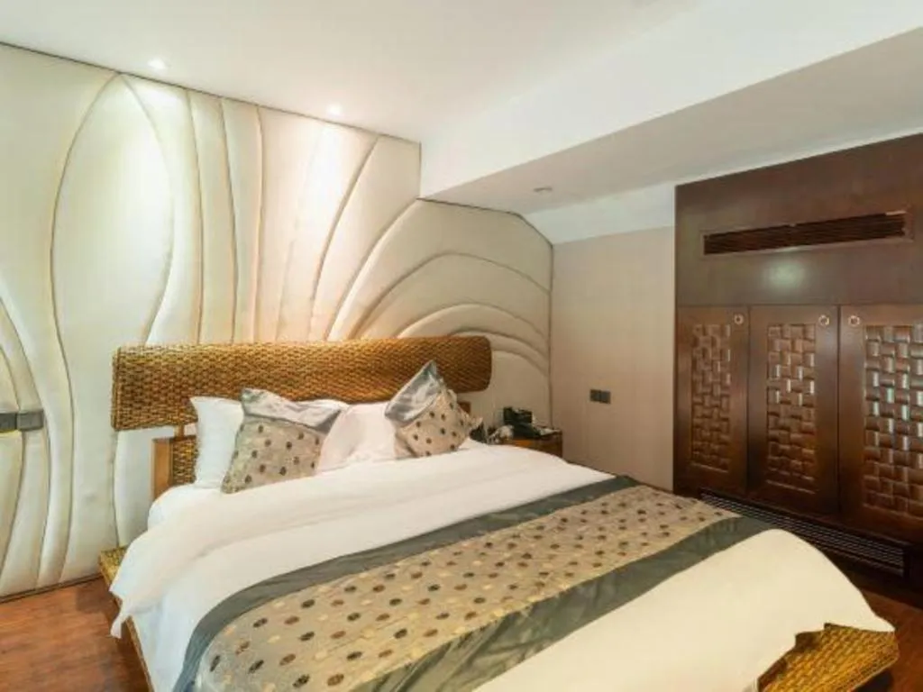 Bed in Fuzhou Chuanjie Hotspring and Golf Club Hotel