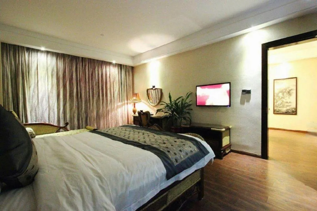Bed in Fuzhou Chuanjie Hotspring and Golf Club Hotel