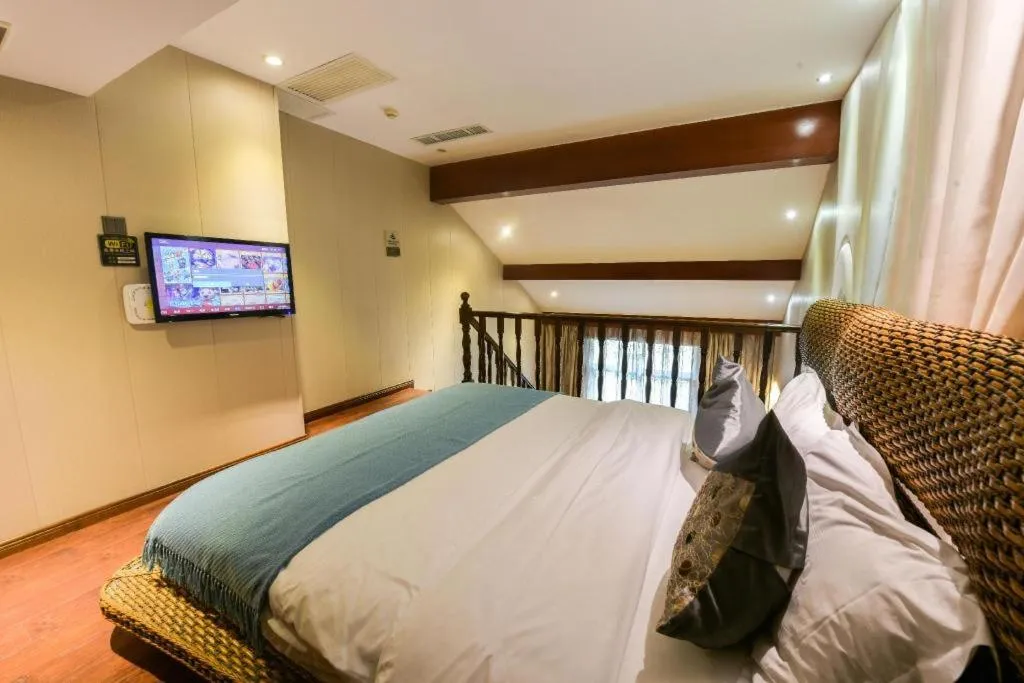 Bed in Fuzhou Chuanjie Hotspring and Golf Club Hotel