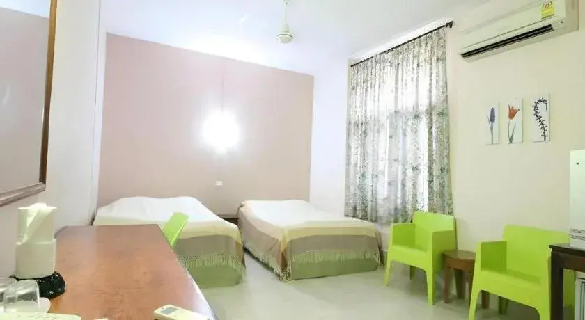 Bed in Numsin Hotel Bed in Numsin Hotel