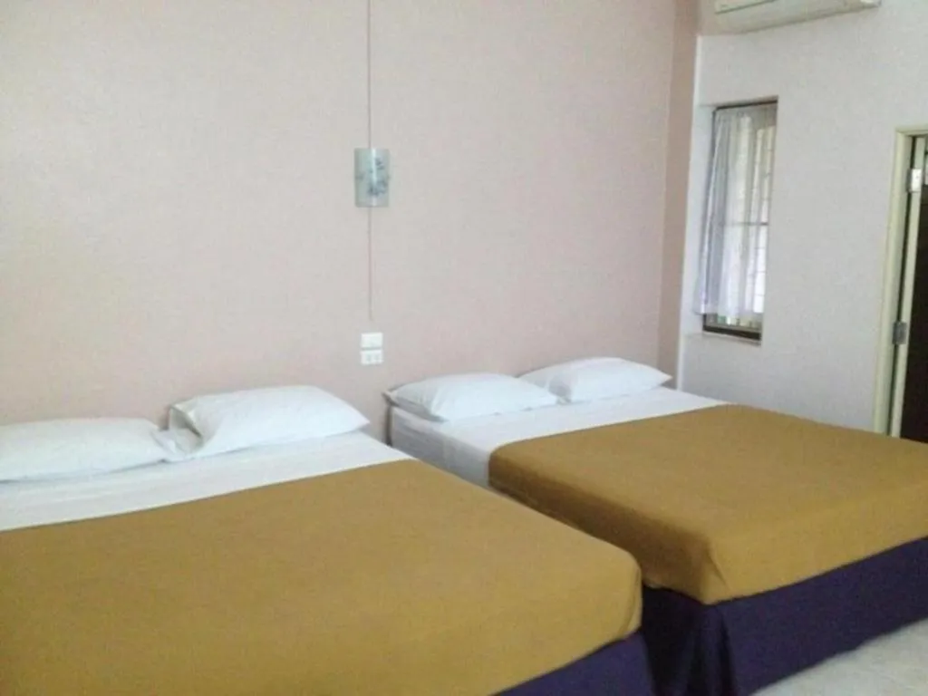 Bed in Numsin Hotel