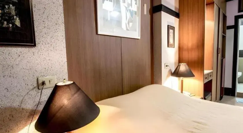 Bed in Numsin Hotel Bed in Numsin Hotel