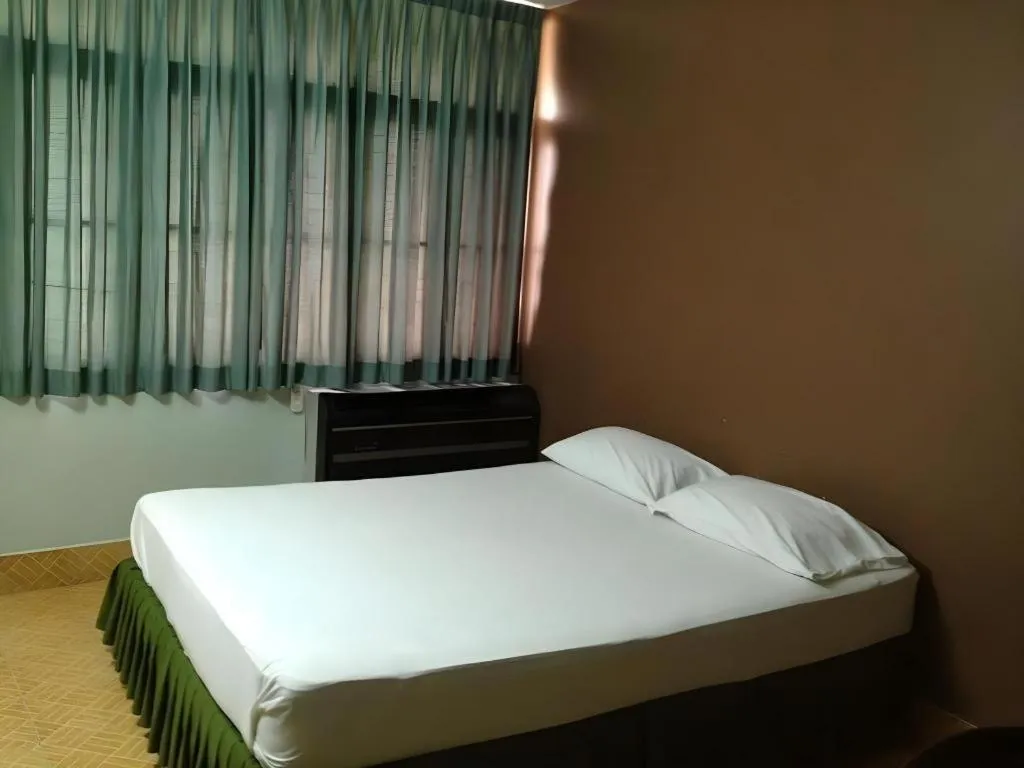 Bed in Numsin Hotel