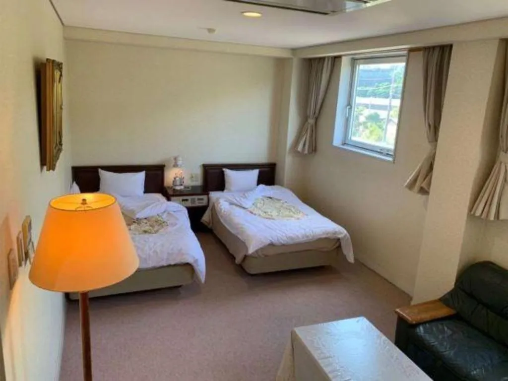 Bed in Tara Kanko Hotel