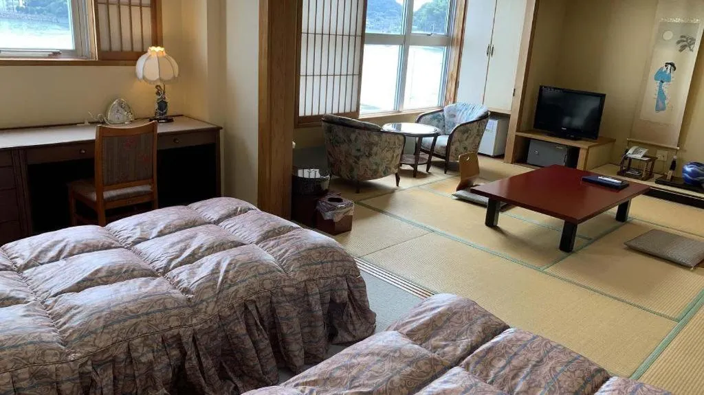 Bed in Tara Kanko Hotel