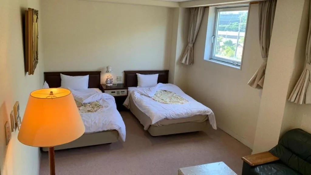 Bed in Tara Kanko Hotel