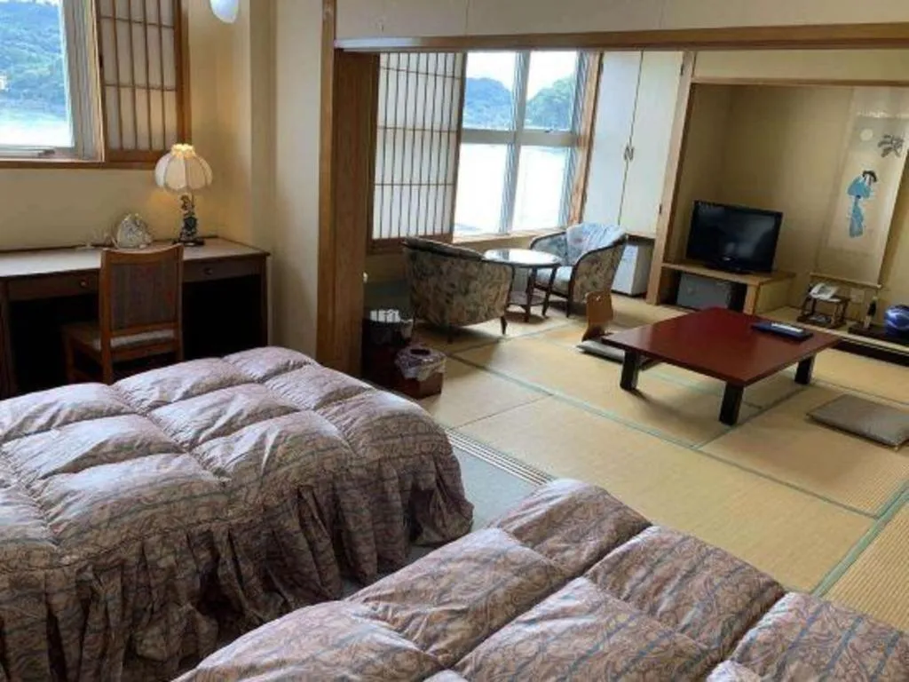 Bed in Tara Kanko Hotel