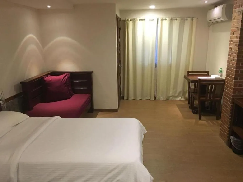 Bed in Mango Valley Hotel