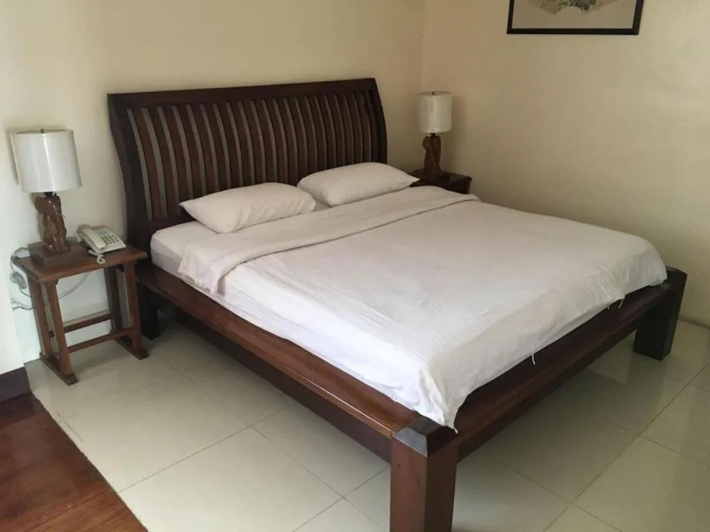 Bed in Mango Valley Hotel