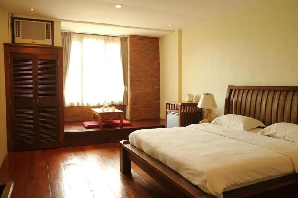 Bed in Mango Valley Hotel