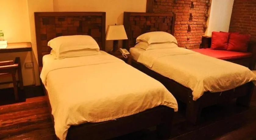 Bed in Mango Valley Hotel