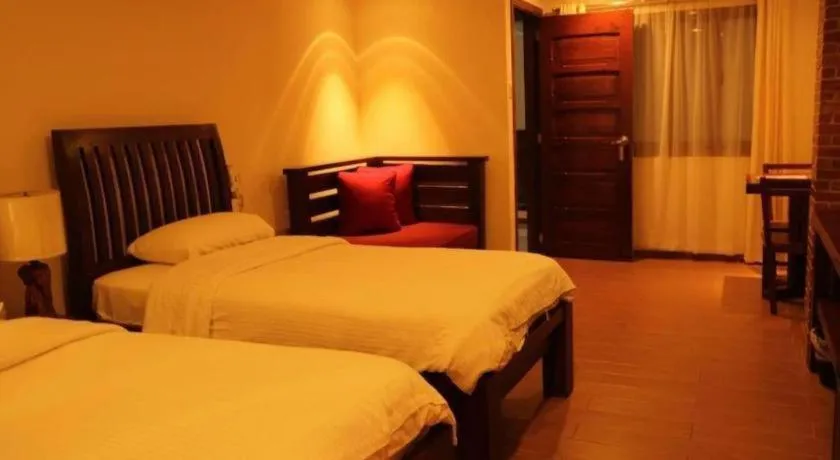 Bed in Mango Valley Hotel