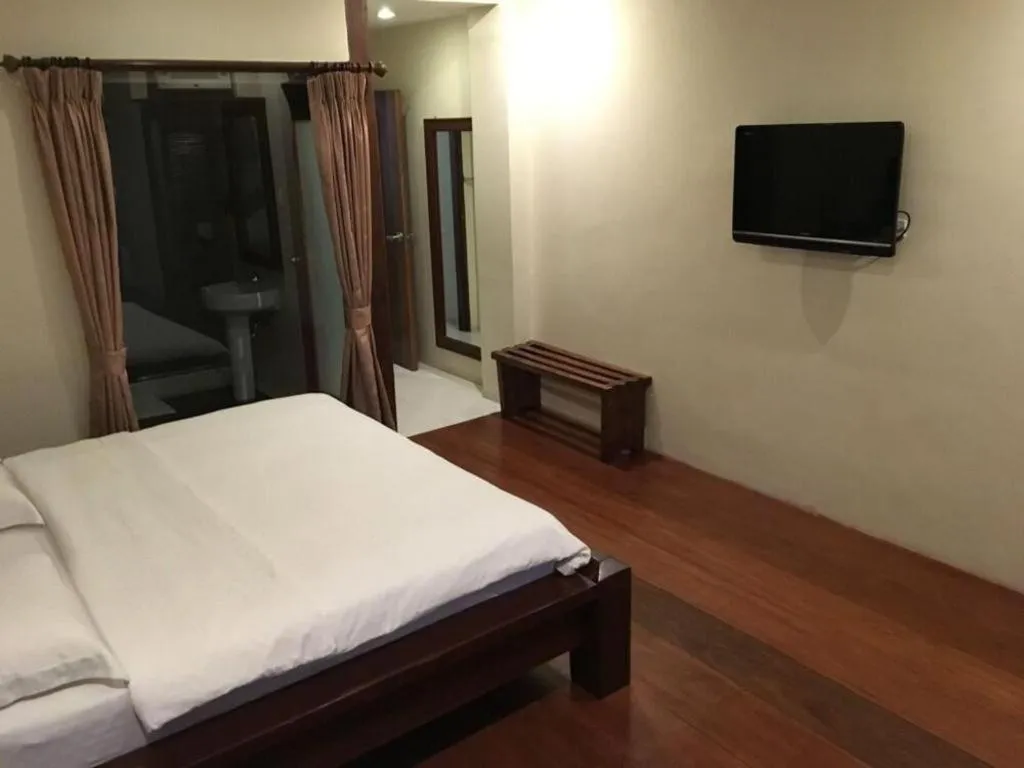 Bed in Mango Valley Hotel