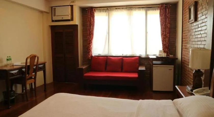 Bed in Mango Valley Hotel