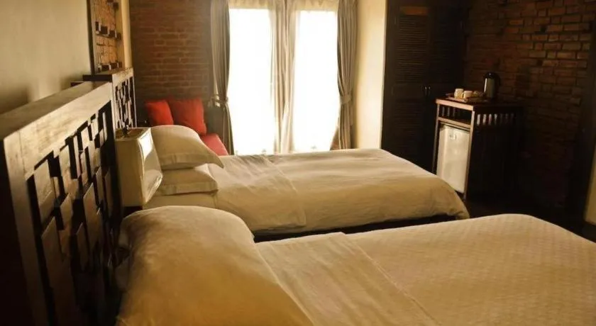 Bed in Mango Valley Hotel