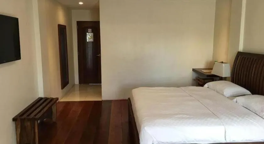 Bed in Mango Valley Hotel