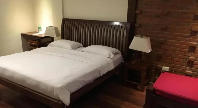 Bed in Mango Valley Hotel