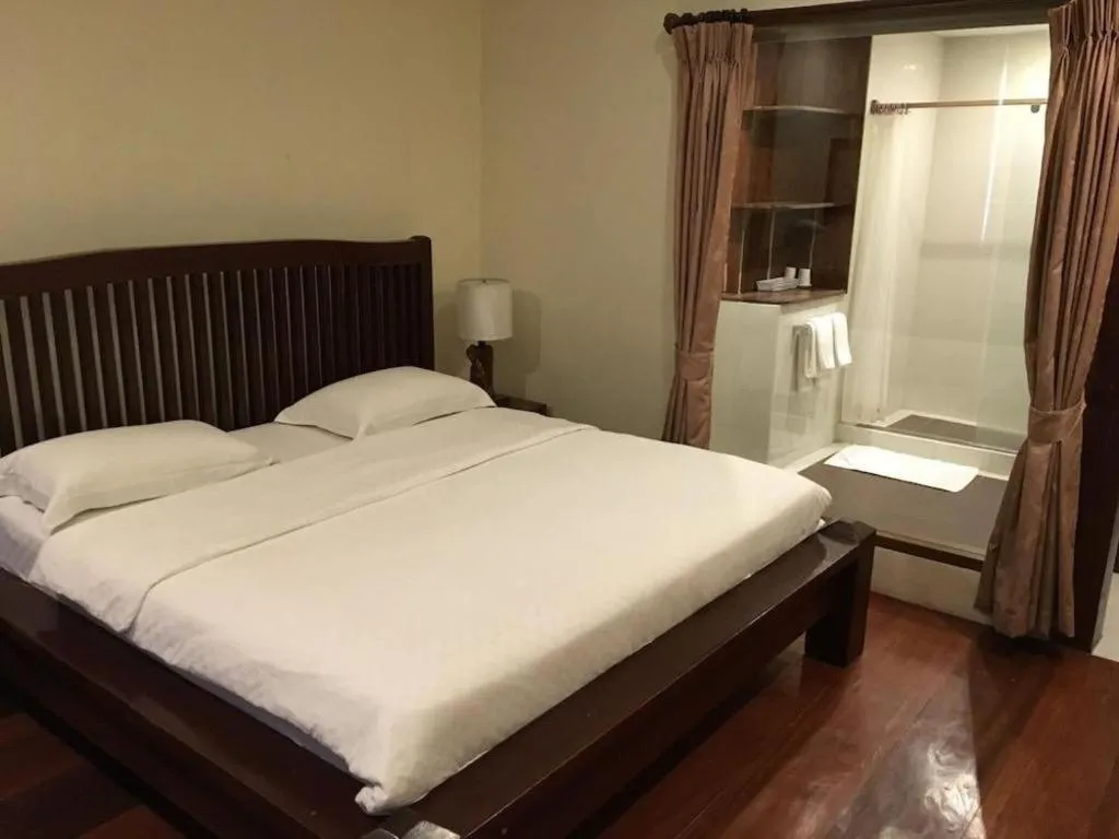 Bed in Mango Valley Hotel