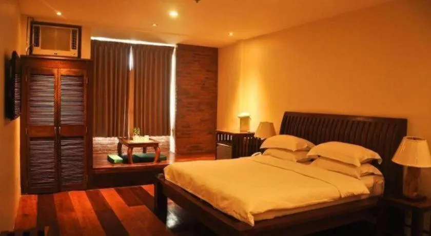Bed in Mango Valley Hotel