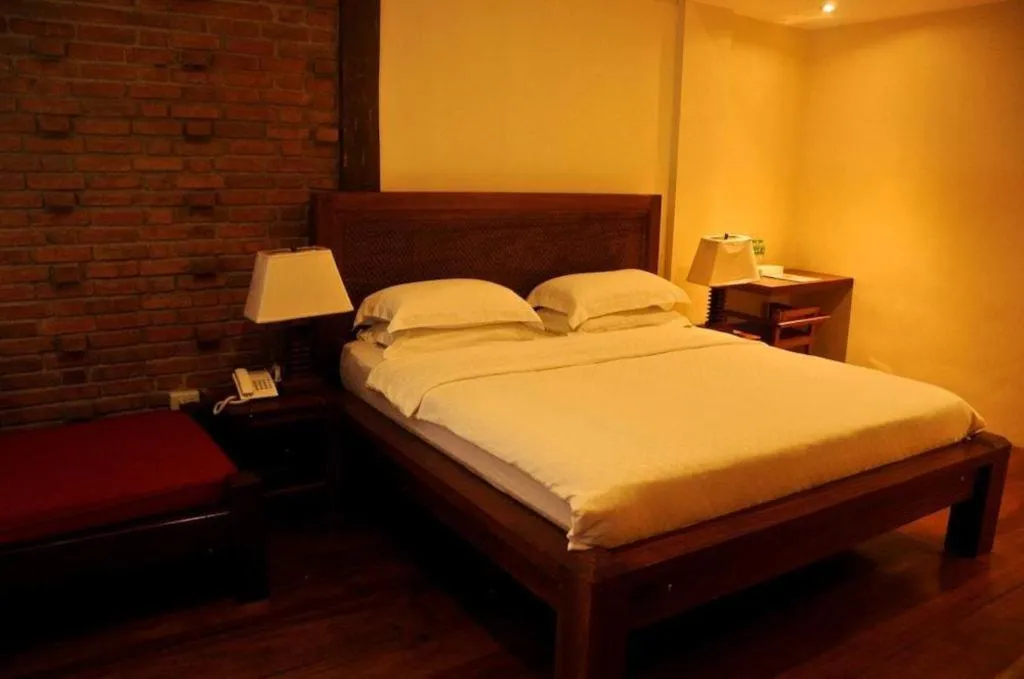 Bed in Mango Valley Hotel