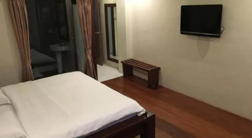 Bed in Mango Valley Hotel
