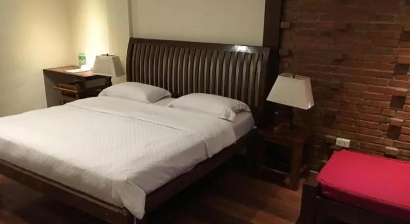 Bed in Mango Valley Hotel