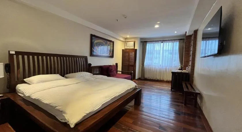 Bed in Mango Valley Hotel