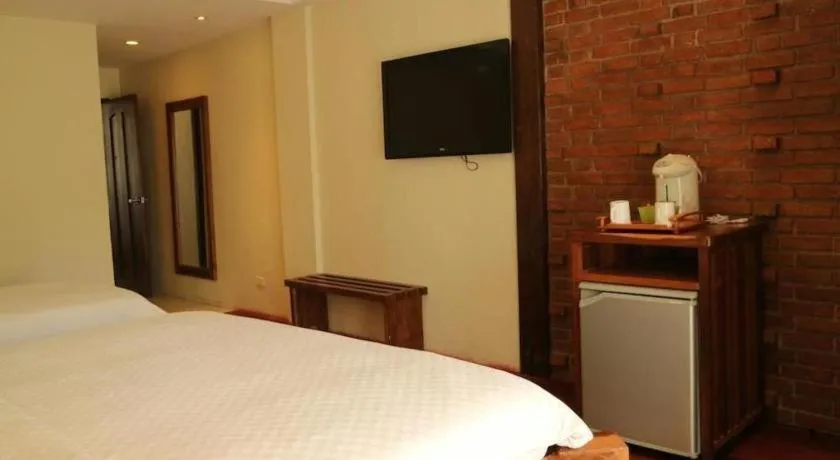 Bed in Mango Valley Hotel