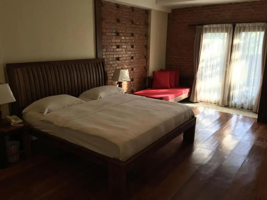 Bed in Mango Valley Hotel