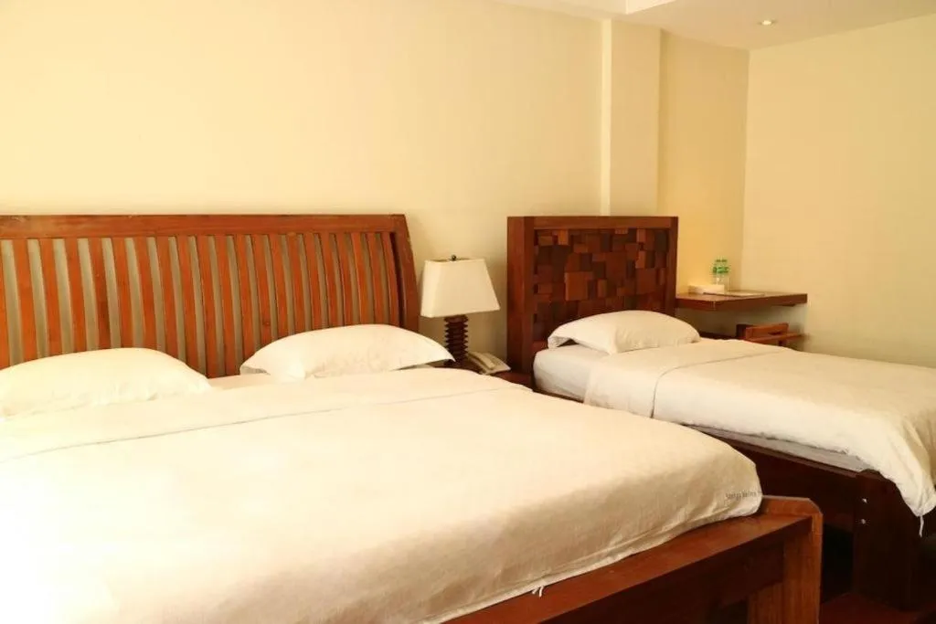 Bed in Mango Valley Hotel