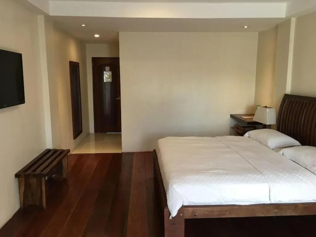 Bed in Mango Valley Hotel