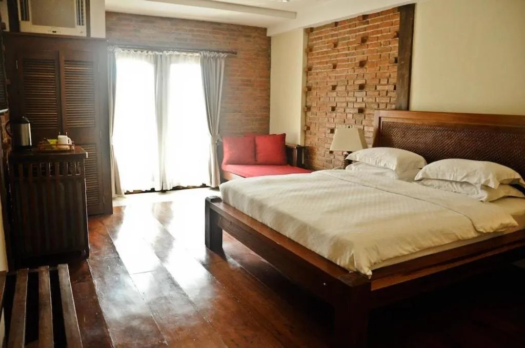 Bed in Mango Valley Hotel