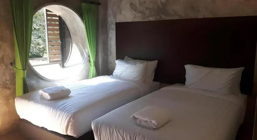 Bed in SabayNan Hotel Bed in SabayNan Hotel