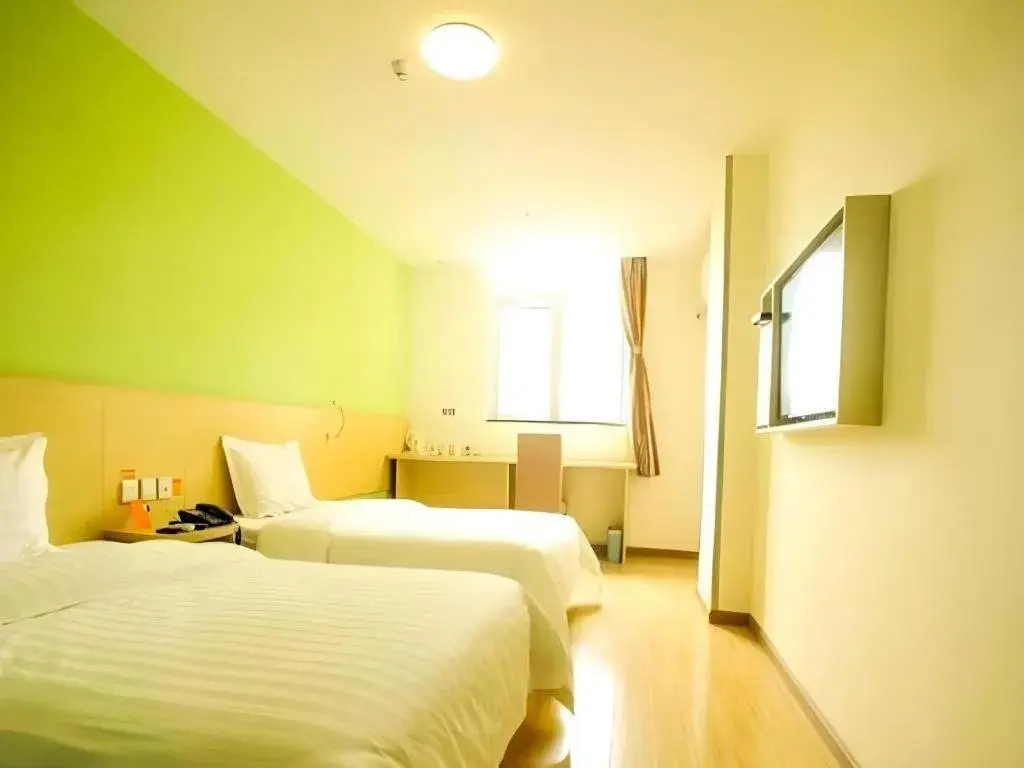 Bed in 7 Days Inn Xichang Hangtian Avenue Toursim Center Bed in 7 Days Inn Xichang Hangtian Avenue Toursim Center