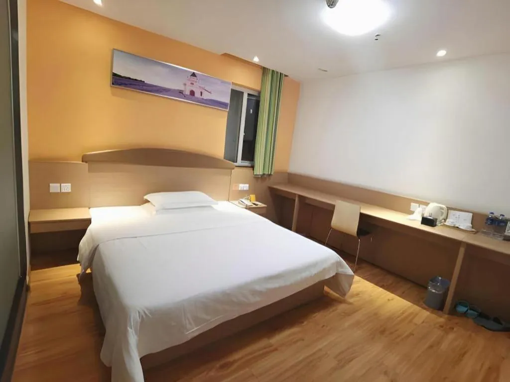 Bed in 7 Days Inn Ya'an Langqiao Pedestrian Street Center