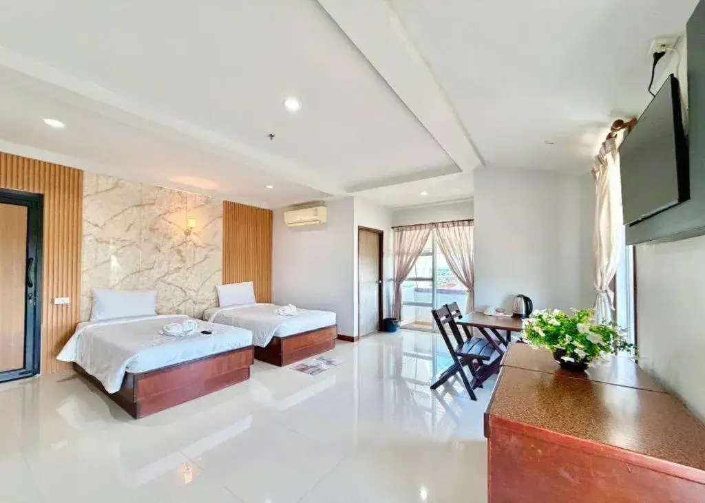 Bed in Century Grand Hotel Bed in Century Grand Hotel