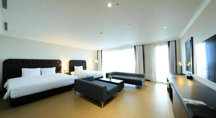 Bed in Jeju Booyoung Hotel