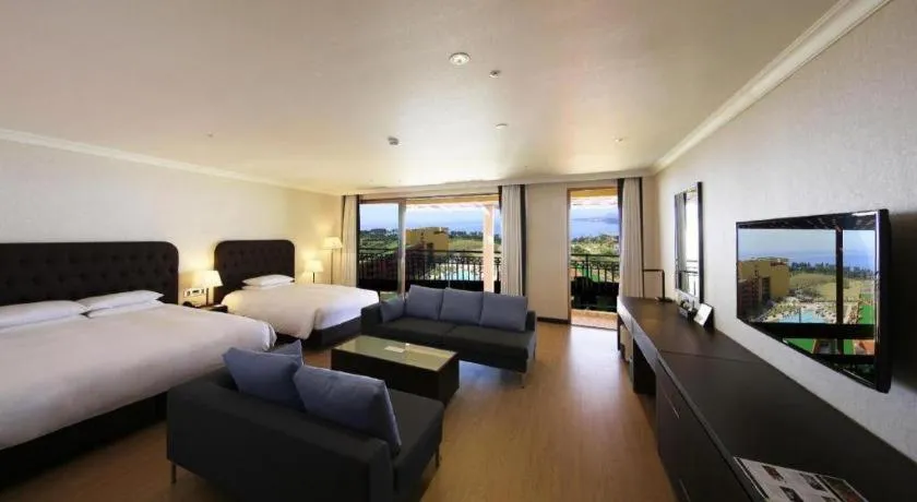 Bed in Jeju Booyoung Hotel