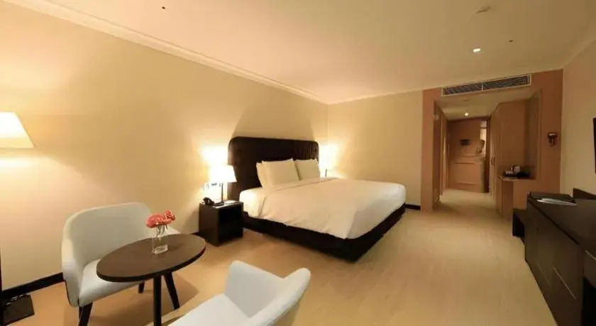 Bed in Jeju Booyoung Hotel Bed in Jeju Booyoung Hotel