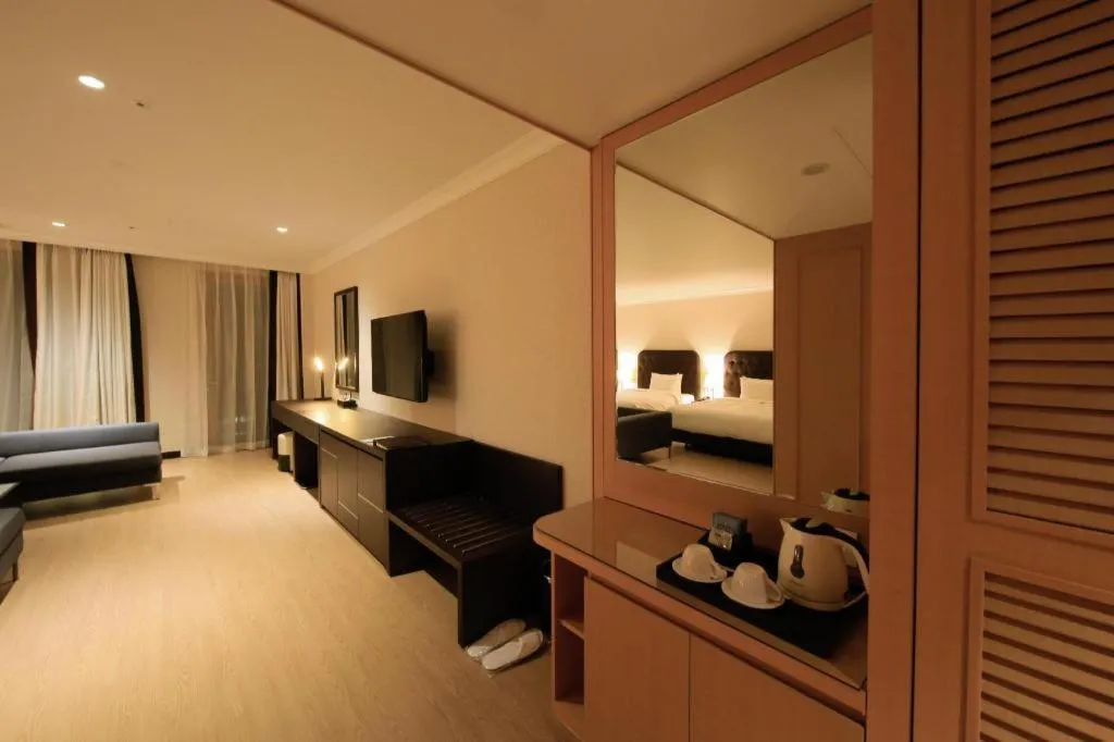 Bed in Jeju Booyoung Hotel