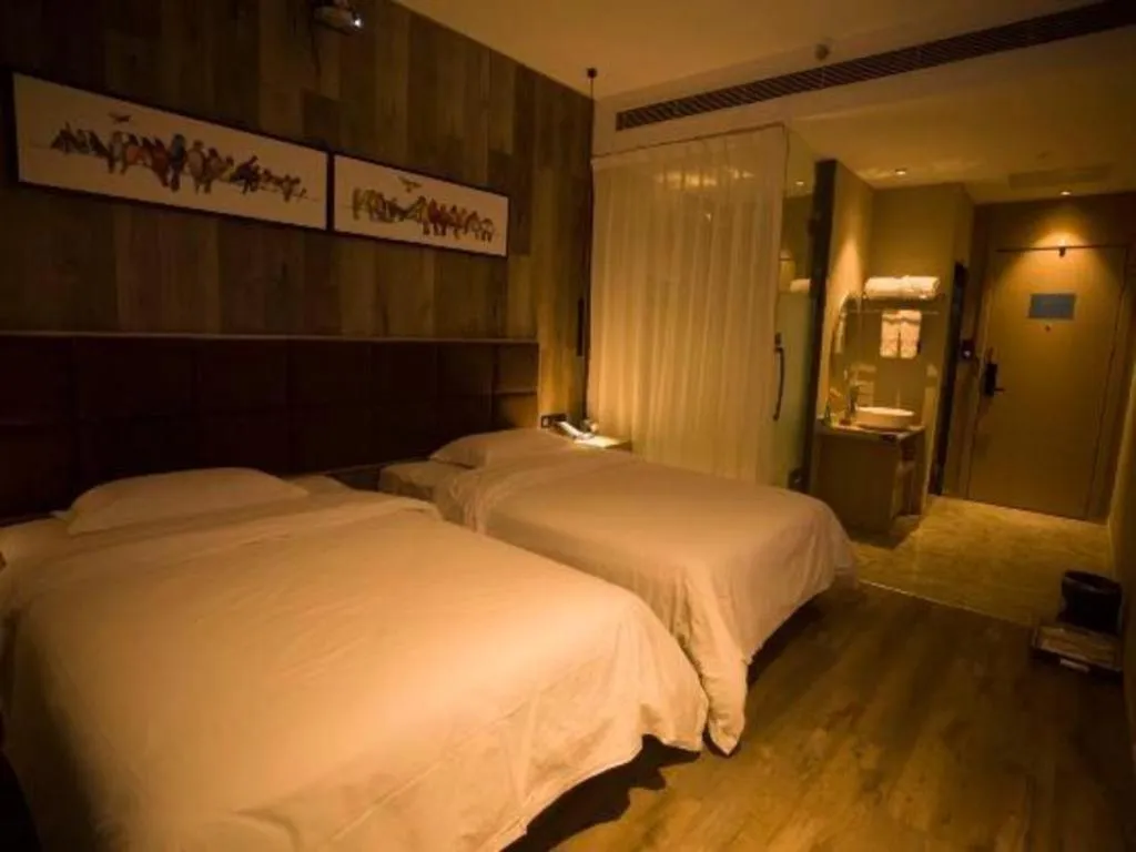 Bed in Qingdao Elegance Hotel