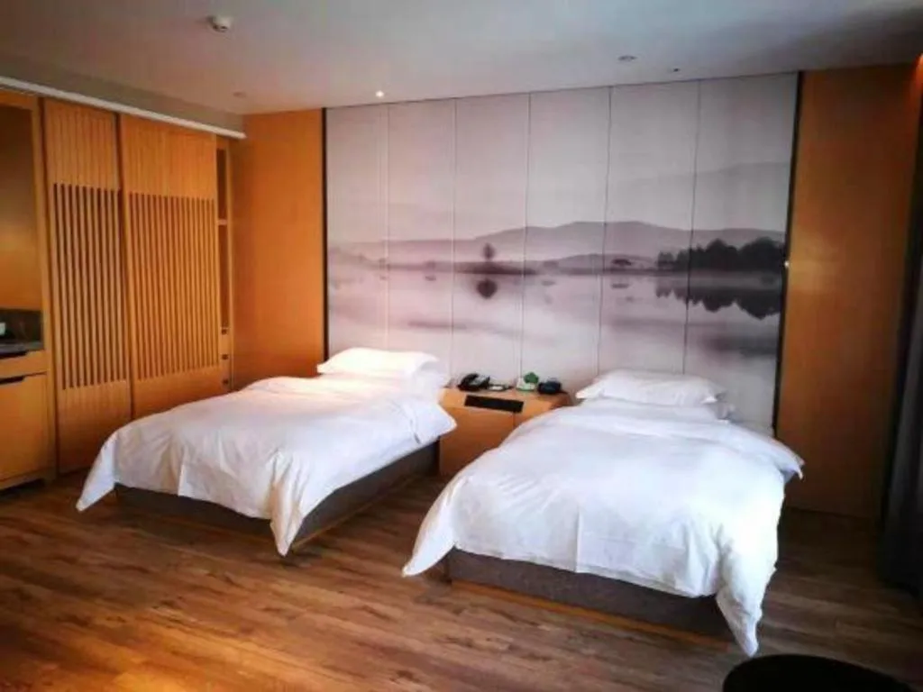 Bed in Qingdao Elegance Hotel