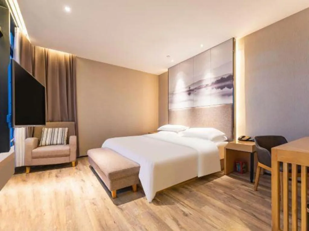 Bed in Qingdao Elegance Hotel