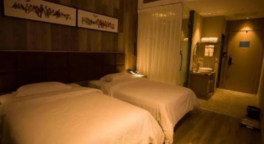 Bed in Qingdao Elegance Hotel