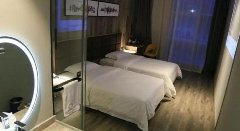 Bed in Qingdao Elegance Hotel