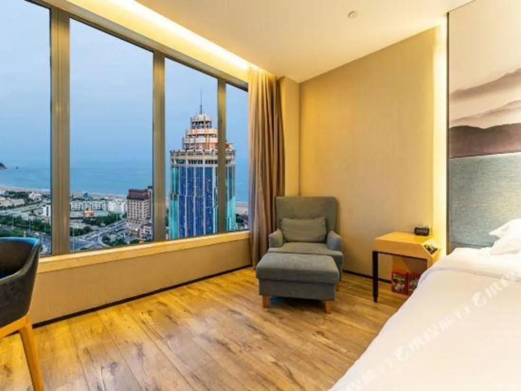 Bed in Qingdao Elegance Hotel